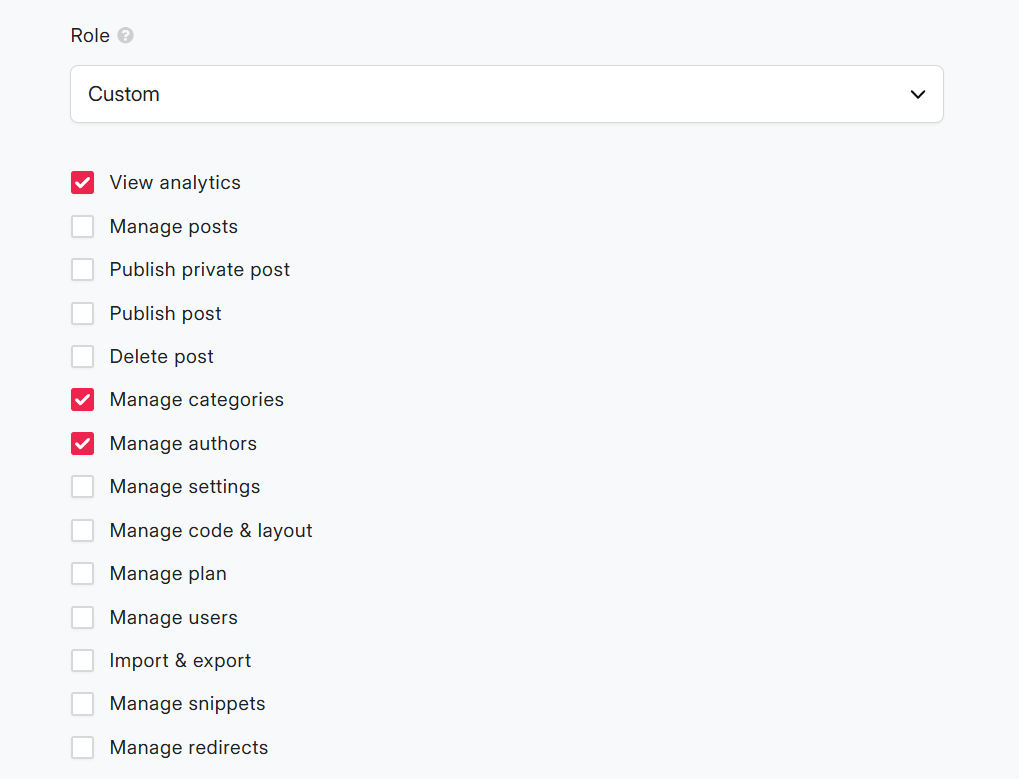 DropInBlog custom role settings showing selected permissions for viewing analytics, managing categories, and managing authors.